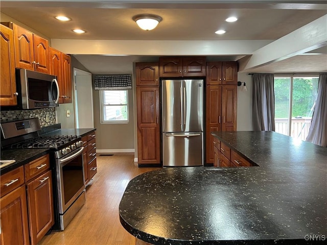 19 Beech Dr, Scriba, NY 13126 - kitchen featuring stainless steel appliances, decorative backsplash, recessed lighting, and light wood-style flooring