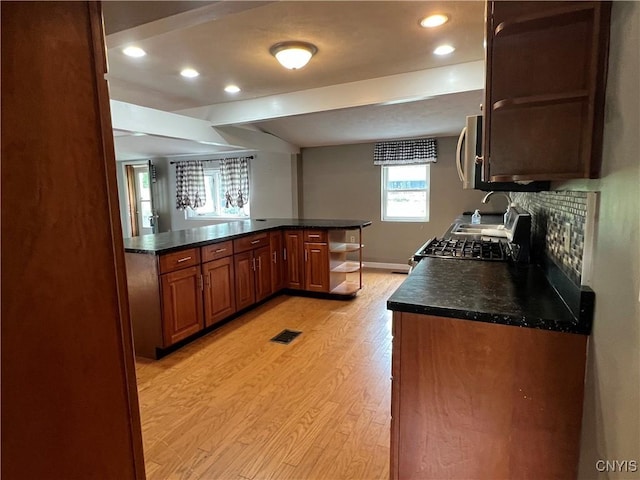 19 Beech Dr, Scriba, NY 13126 - kitchen featuring light wood-type flooring, dark countertops, open shelves, and recessed lighting
