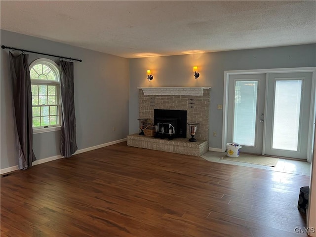 19 Beech Dr, Scriba, NY 13126 - unfurnished living room featuring wood finished floors and a textured ceiling