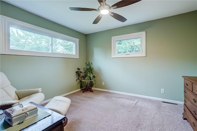 286 Park Ln, Webster, NY 14580 - sitting room featuring plenty of natural light, light colored carpet, and ceiling fan