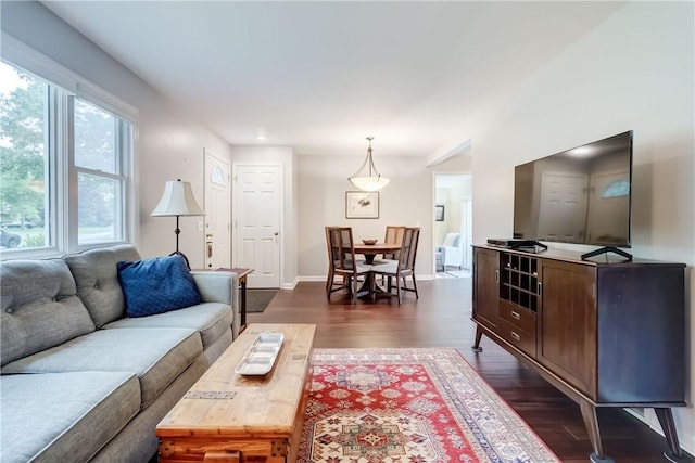 286 Park Ln, Webster, NY 14580 - living area featuring dark wood finished floors and baseboards