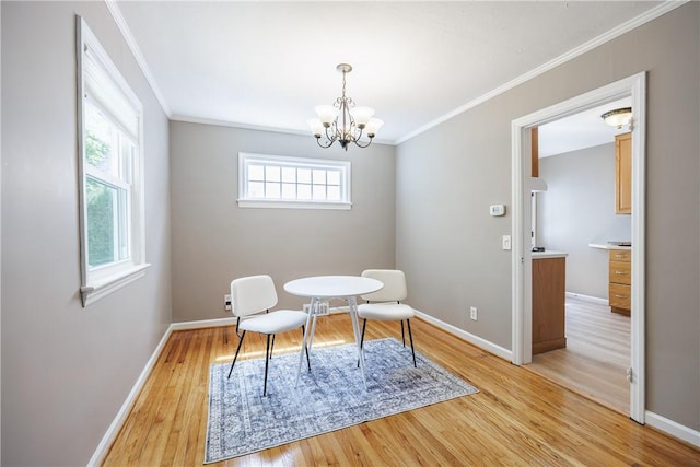 79 Meredith Ave, Brighton, NY 14618 - sitting room with ornamental molding, light wood-style flooring, and a chandelier