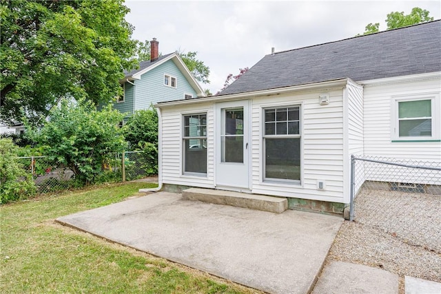 79 Meredith Ave, Brighton, NY 14618 - rear view of property with a patio area and a fenced backyard