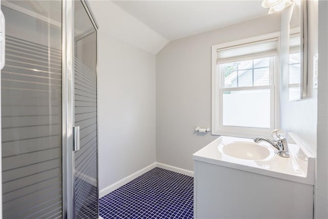 79 Meredith Ave, Brighton, NY 14618 - bathroom featuring vanity, a shower stall, vaulted ceiling, and tile patterned floors