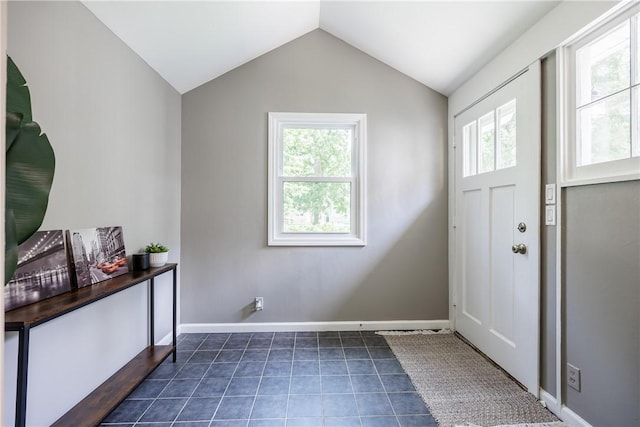 79 Meredith Ave, Brighton, NY 14618 - entrance foyer with plenty of natural light, vaulted ceiling, and dark tile patterned flooring