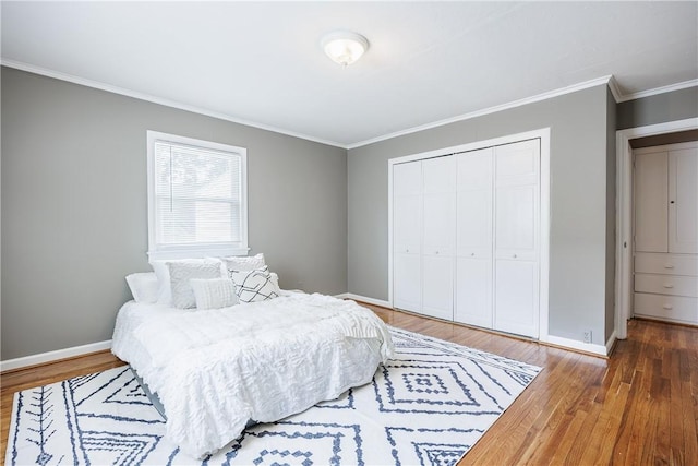 79 Meredith Ave, Brighton, NY 14618 - bedroom with a closet, wood finished floors, and crown molding
