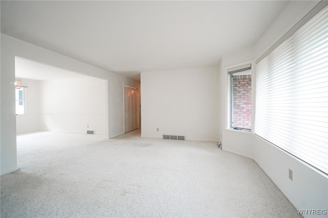 100 W Maplemere Rd, Amherst, NY 14221 - empty room featuring healthy amount of natural light and carpet