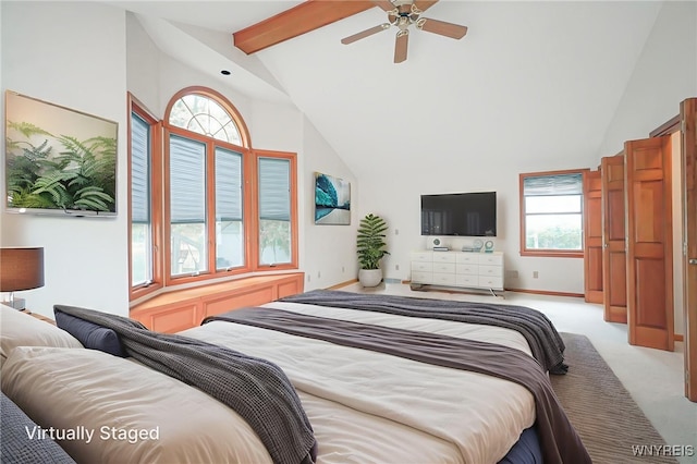 100 W Maplemere Rd, Amherst, NY 14221 - bedroom featuring beam ceiling, high vaulted ceiling, and light colored carpet