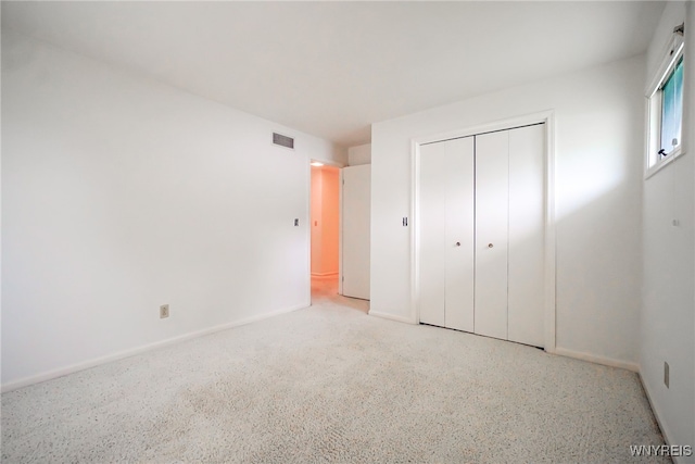 100 W Maplemere Rd, Amherst, NY 14221 - unfurnished bedroom featuring a closet and baseboards