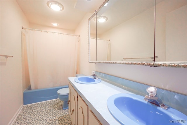100 W Maplemere Rd, Amherst, NY 14221 - full bathroom featuring double vanity, shower / bath combo with shower curtain, and tile patterned floors