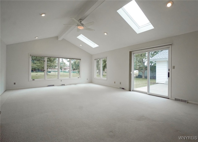 100 W Maplemere Rd, Amherst, NY 14221 - empty room with a skylight, beamed ceiling, carpet floors, ceiling fan, and recessed lighting