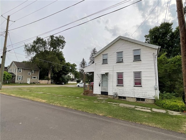 22 Jefferson St, North Dansville, NY 14437 - view of front facade with a front yard