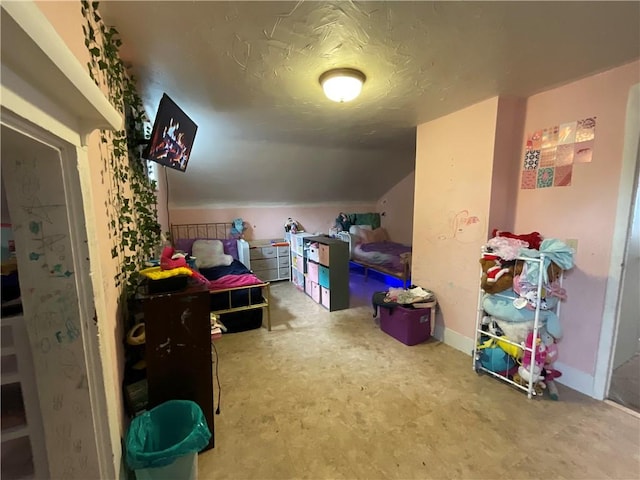 22 Jefferson St, North Dansville, NY 14437 - bedroom featuring vaulted ceiling and baseboards