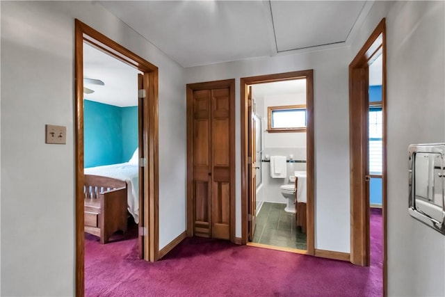 128 Princeton Blvd, Tonawanda, NY 14217 - hall featuring dark colored carpet and baseboards