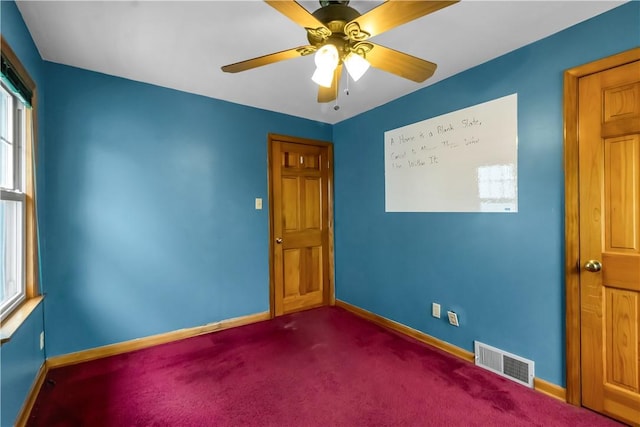 128 Princeton Blvd, Tonawanda, NY 14217 - spare room with dark carpet and ceiling fan