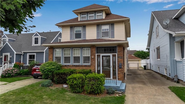 128 Princeton Blvd, Tonawanda, NY 14217 - view of front of property featuring a detached garage and roof with shingles