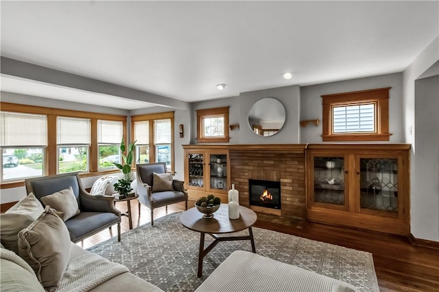 128 Princeton Blvd, Tonawanda, NY 14217 - living room featuring wood finished floors, a fireplace, and recessed lighting