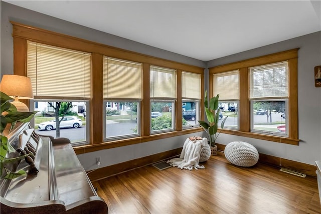 128 Princeton Blvd, Tonawanda, NY 14217 - sunroom featuring healthy amount of natural light and wood finished floors