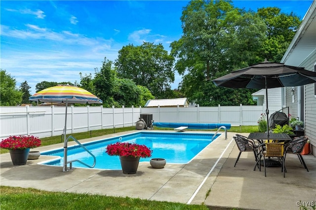 102 W Rand St, German Flatts, NY 13357 - view of swimming pool with a fenced backyard and a patio