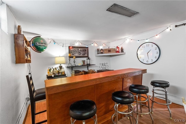 102 W Rand St, German Flatts, NY 13357 - indoor bar featuring wood finished floors and baseboards