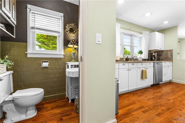 102 W Rand St, German Flatts, NY 13357 - bathroom featuring wood finished floors, tile walls, vanity, and recessed lighting