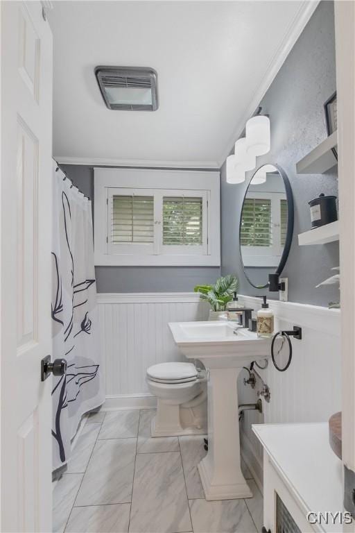 207 Baxton St, Clay, NY 13212 - bathroom with toilet and a wainscoted wall