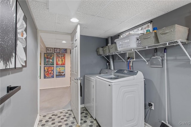 207 Baxton St, Clay, NY 13212 - laundry area featuring washing machine and clothes dryer and baseboards