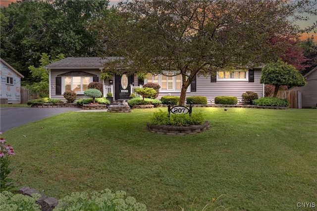 207 Baxton St, Clay, NY 13212 - view of property hidden behind natural elements featuring a front yard