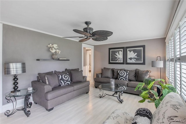 207 Baxton St, Clay, NY 13212 - living room featuring wood finished floors, a ceiling fan, and ornamental molding