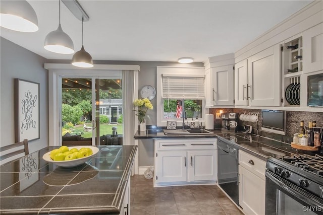207 Baxton St, Clay, NY 13212 - kitchen featuring black appliances, dark countertops, white cabinetry, tile patterned floors, and decorative backsplash