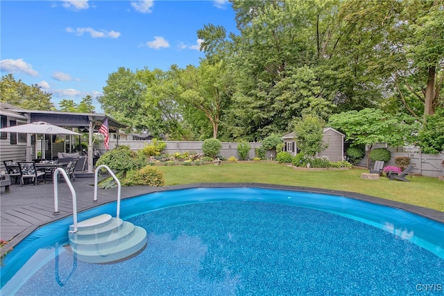 207 Baxton St, Clay, NY 13212 - view of swimming pool with a fenced backyard, an outdoor structure, a deck, and outdoor dining area
