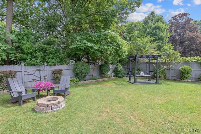 207 Baxton St, Clay, NY 13212 - fenced backyard with a fire pit and a pergola