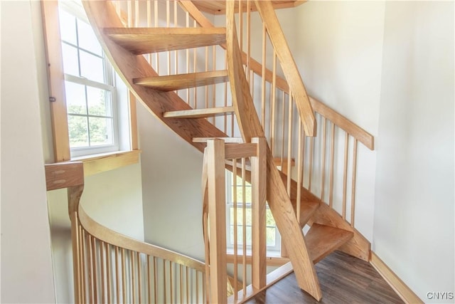 1812 Grenadier Island Rd Unit 1, Cape Vincent, NY 13618 - stairway with wood finished floors and baseboards