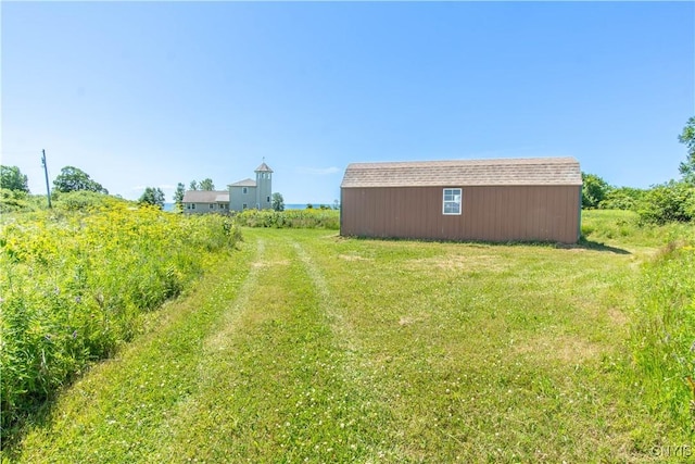 1812 Grenadier Island Rd Unit 1, Cape Vincent, NY 13618 - view of grassy yard featuring an outbuilding