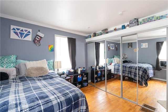 82 Maple St, Canisteo, NY 14823 - bedroom with light wood-style floors and a closet