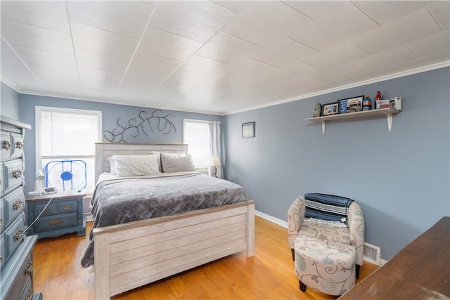 82 Maple St, Canisteo, NY 14823 - bedroom with light wood finished floors and ornamental molding