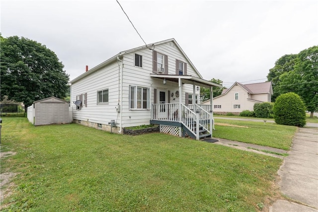 82 Maple St, Canisteo, NY 14823 - view of front of property with a storage shed and a front lawn