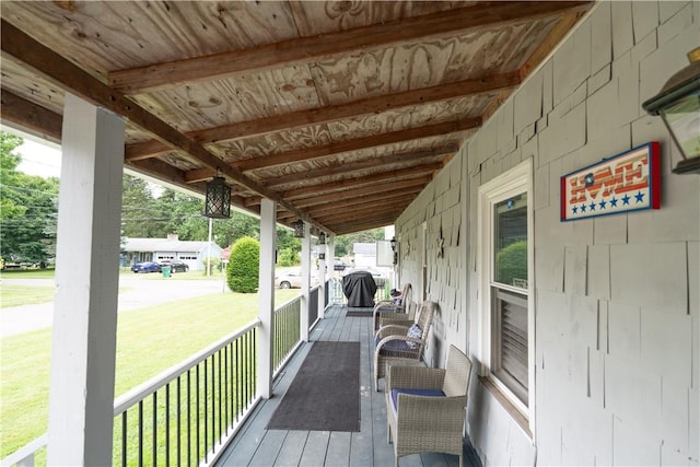 82 Maple St, Canisteo, NY 14823 - wooden porch with a yard