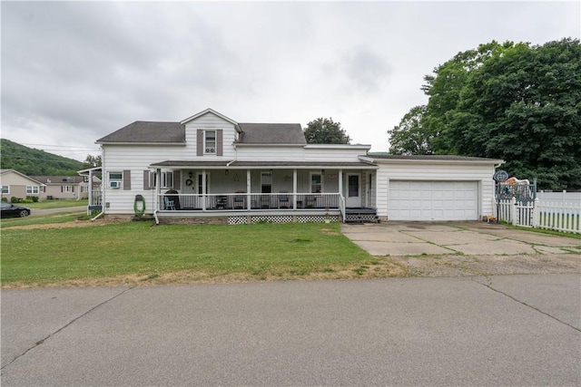 82 Maple St, Canisteo, NY 14823 - view of front of property with a porch, a garage, and concrete driveway