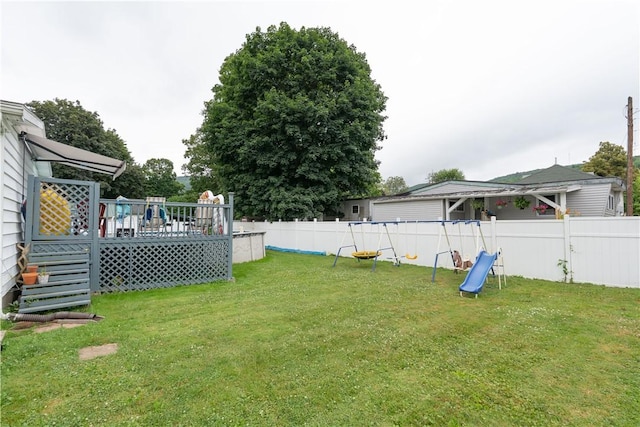 82 Maple St, Canisteo, NY 14823 - fenced backyard featuring a wooden deck