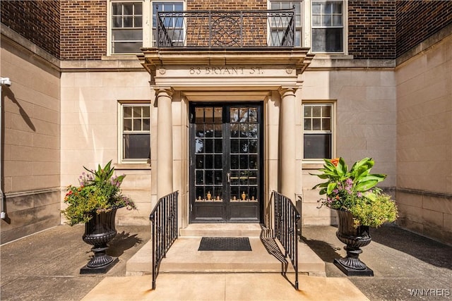 83 Bryant # 7Ab, Buffalo, NY 14209 - property entrance with a balcony, french doors, and brick siding