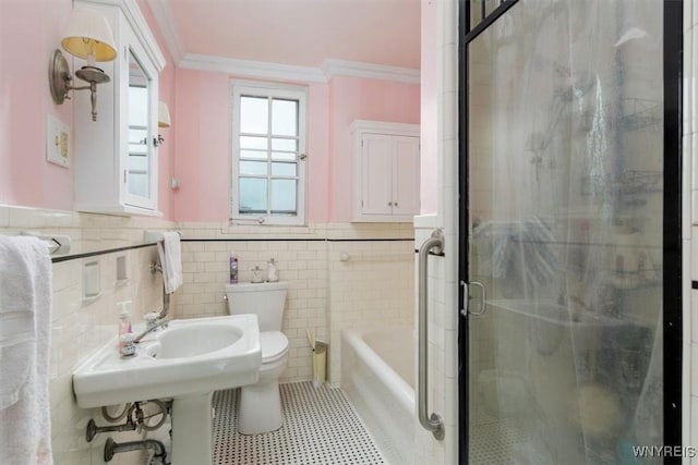 83 Bryant # 7Ab, Buffalo, NY 14209 - bathroom with crown molding, a wainscoted wall, a shower with door, tile walls, and a tub to relax in