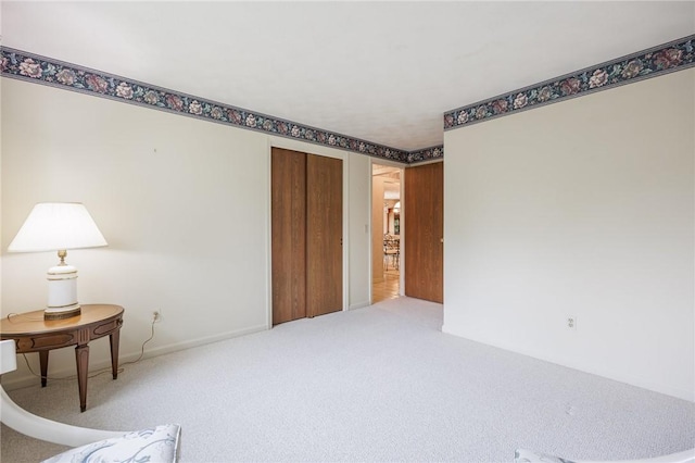 668 Willow Ln, Webster, NY 14580 - sitting room featuring carpet floors and baseboards