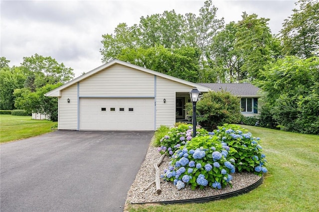668 Willow Ln, Webster, NY 14580 - ranch-style home with a front yard and view of scattered trees