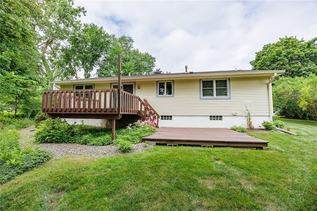 668 Willow Ln, Webster, NY 14580 - rear view of house with a wooden deck and a lawn