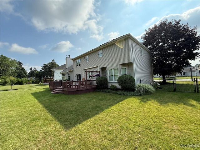 26 Forestglen Cir, Amherst, NY 14221 - back of house with a wooden deck and a chimney
