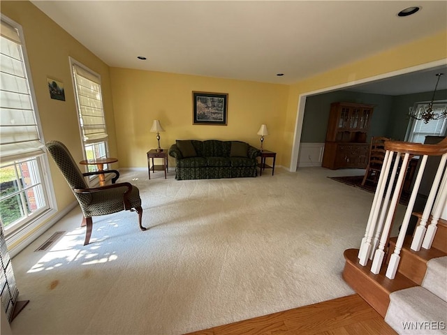 26 Forestglen Cir, Amherst, NY 14221 - living area featuring a chandelier and carpet