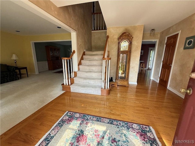 26 Forestglen Cir, Amherst, NY 14221 - foyer entrance with stairway and wood finished floors