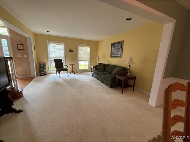 26 Forestglen Cir, Amherst, NY 14221 - living room with light colored carpet and healthy amount of natural light