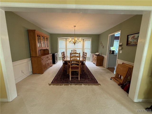 26 Forestglen Cir, Amherst, NY 14221 - dining area with a chandelier and light carpet